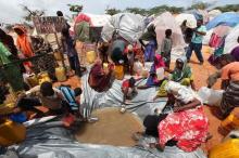 Internally displaced Somali people gather around a water point at a settlement camp in Hodan district south of capital Mogadishu. PHOTO BY REUTERS/Feisal Omar