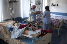 Vardan Andreasyan (front), 12, and Gevorg Grigoryan, 12, who were wounded in a recent shelling during clashes between Armenian and Azeri forces in Nagorno-Karabakh region which is controlled by separatist Armenians, receive treatment at a hospital in Nagorno Karabakh's main city of Stepanakert, April 2, 2016. PHOTO BY REUTERS/Areg Balayan
