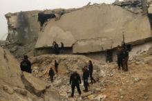 Civil defence members and people inspect a damaged mosque after an airstrike on the rebel-held village of al-Jina, Aleppo province in northwest Syria, March 17, 2017. PHOTO BY REUTERS/Ammar Abdullah