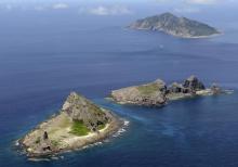 A group of disputed islands, Uotsuri island (top), Minamikojima (bottom) and Kitakojima, known as Senkaku in Japan and Diaoyu in China, September 2012. PHOTO BY REUTERS/Kyodo