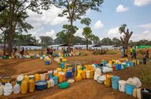 Empty jerrycans are arranged by refugees from Burundi who fled the ongoing violence and political tension at a water tap at the Nyarugusu refugee camp in western Tanzania, May 28, 2015. PHPTO BY REUTERS 
