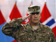 U.S. General John Campbell, commander of NATO-led International Security Assistance Force (ISAF), salutes during the change of mission ceremony in Kabul, December 28, 2014. PHOTO BY REUTERS/Omar Sobhani