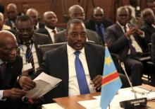 Democratic Republic of Congo's President Joseph Kabila attends a two-day meeting of leaders from the Southern African Development Community (SADC) in Pretoria November 4, 2013. PHOTO BY REUTERS/Siphiwe Sibeko