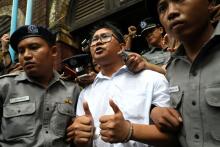 Reuters journalist Wa Lone departs Insein court after his verdict announcement in Yangon, Myanmar, September 3, 2018. PHOTO BY REUTERS/Ann Wang