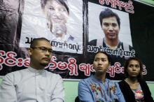 Pan Ei Mon (C), wife of Reuters reporter Wa Lone and Nyo Nyo Aye (R), sister of Reuters reporter Kyaw Soe Oo attend a news conference in Yangon, Myanmar, December 28, 2017. PHOTO BY REUTERS/Stringer