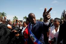 Haitian President Jovenel Moise gestures at his arrival to the National Palace during his inauguration ceremony in Port-au-Prince, Haiti, February 7, 2017. PHOTO BY REUTERS/Andres Martinez Casares