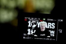 Julian Assange, Founder and Editor-in-Chief of WikiLeaks speaks via video link during a press conference on the occasion of the ten year anniversary celebration of WikiLeaks in Berlin, Germany, October 4, 2016. PHOTO BY REUTERS/Axel Schmidt