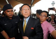 North Korean Ambassador to Malaysia Kang Chol (C), who was expelled from Malaysia, arrives at Kuala Lumpur International Airport in Sepang, Malaysia, March 6, 2017. PHOTO BY REUTERS/Lai Seng Sin