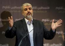 Hamas leader Khaled Meshaal talks during a news conference in Doha