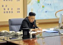 North Korean leader Kim Jong-un presides over an operation meeting on the Korean People's Army Strategic Rocket Force's performance of duty for firepower strike at the Supreme Command in Pyongyang, in this March 29, 2013 file photo released by the North's official KCNA news agency. PHOTO BY REUTERS/KCNA