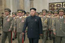 North Korean leader Kim Jong Un (4th R) visits the Kumsusan Palace of the Sun to pay tribute to founding President Kim Il Sung and former leader Kim Jong Il to mark the 61st anniversary of the victory of the Korean people in the Fatherland Liberation War in Pyongyang