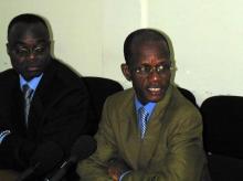 Ivory Coast's former Interior Minister Emile Boga Doudou (R) and former Defence Minister Moise Lida Kouassi (L) address journalists during a news conference in Abidjan. PHOTO BY REUTERS