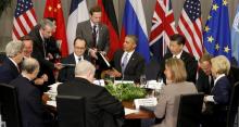 U.S. President Barack Obama hosts a meeting with members of the P5+1 during the Nuclear Security Summit in Washington April 1, 2016. Flanking Obama are French President Francois Hollande (L) and Chinese President Xi Jinping. PHOTO BY REUTERS/Kevin Lamarque