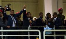 Eritrea's President Isaias Afwerki and Ethiopian Prime Minister Abiy Ahmed hold hands during a concert at the Millennium Hall in Addis Ababa, Ethiopia, July 15, 2018. PHOTO BY REUTERS/Tiksa Negeri
