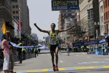 Lemi Berhanu Hayle of Ethiopia crosses the finish line to win the men's division of the 120th running of the Boston Marathon in Boston, Massachusetts, April 18, 2016. PHOTO BY REUTERS/Brian Snyder