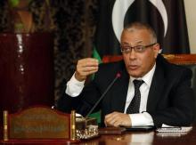 Libyan Prime Minister Ali Zeidan speaks during a joint news conference