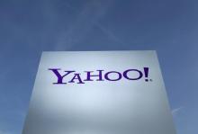 A Yahoo logo is pictured in front of a building in Rolle, 30 km (19 miles) east of Geneva, Switzerland on December 12, 2012. PHOTO BY REUTERS/Denis Balibouse