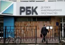A man walks towards the RBC media group office building in Moscow, Russia, April 15, 2016. PHOTO BY REUTERS/Maxim Zmeyev