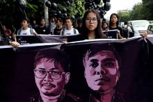 People march to show solidarity for jailed Reuters journalists Wa Lone and Kyaw Soe Oo two days before a local court is due to deliver verdict against them on charges of breaching the country's Official Secrets Act in Yangon, Myanmar, September 1, 2018. PHOTO BY REUTERS/Ann Wang