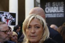 France's far-right National Front political party leader Marine Le Pen attends a gathering in front of the town hall in Beaucaire, paying tribute to the victims of the shooting by gunmen at the offices of the satirical weekly newspaper Charlie Hebdo, January 11, 2015. PHOTO BY REUTERS/Philippe Laurenson