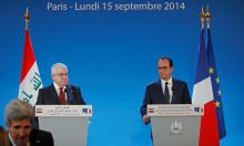 French President Francois Hollande (R), Iraq's President Fuad Masum and U.S. Secretary of State John Kerry (front, L) arrive to attend the opening of an international conference bringing together about 30 countries to discuss how to cooperate in the fight against Islamic State militants in Paris