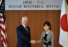U.S. Defense Secretary Jim Mattis (L) shakes hands with Japan's Defense Minister Tomomi Inada during their meeting at the Defense Ministry in Tokyo, Japan, February 4, 2017. PHOTO BY REUTERS/Franck Robichon