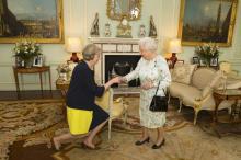 Britain's Queen Elizabeth welcomes Theresa May at the start of an audience in Buckingham Palace, where she invited her to become Prime Minister, in London, July 13, 2016. PHOTO BY REUTERS/Dominic Lipinski
