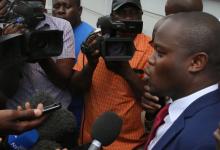 Political activist and leader of the Tajamuka/Sesjikile Movement Promise Mkwananzi speaks to the media outside the Constitutional Court in Harare, Zimbabwe, February 8, 2017. PHOTO BY REUTERS/Philimon Bulawayo