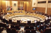 A general view shows Palestinian chief negotiator Saeb Erekat and Arab League Chief Nabil el-Araby during the meeting at the Arab League in Cairo