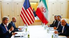 U.S. Secretary of State John Kerry (L) and Iran's Foreign Minister Mohammad Javad Zarif attend a bilateral meeting in Vienna, Austria, May 17, 2016. PHOTO BY REUTERS/Leonhard Fogger