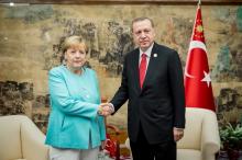 German Chancellor Angela Merkel meets Turkish President Tayyip Erdogan during the G20 Summit in Hangzhou, Zhejiang province, China, September 4, 2016. PHOTO BY REUTERS/Jesco Denzel
