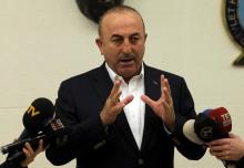 Turkish Foreign Minister Mevlut Cavusoglu speaks during a news conference at Ataturk International airport in Istanbul, Turkey, March 11, 2017. PHOTO BY REUTERS/Huseyin Aldemir
