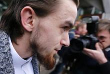 Michael Delefortrie, who is convicted of being part of "Sharia4Belgium", leaves after the verdict is delivered in a trial of the group in Antwerp, February 11, 2015. PHOTO BY REUTERS/Francois Lenoir