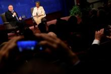 U.S. Secretary of State Mike Pompeo speaks with Heritage Foundation President Kay Coles James after his remarks on the Trump administration's Iran policy at the Heritage Foundation in Washington, U.S. May 21, 2018. PHOTO BY REUTERS/Jonathan Ernst