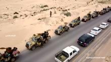 An aerial view shows military vehicles on a road in Libya, April 4, 2019, in this still image taken from video. PHOTO BY REUTER/Reuters TV 