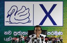 Sri Lanka's common presidential candidate Mithripala Sirisena gestures as he addresses the nation at his party's office in Colombo, January 5, 2015. PHOTO BY REUTERS/Dinuka Liyanawatte