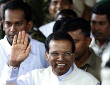Sri Lanka's newly elected president Mithripala Sirisena waves at media as he leaves the election commission in Colombo, January 9, 2015. PHOTO BY REUTERS/Dinuka Liyanawatte