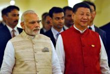 Indian Prime Minister Narendra Modi (L) and Chinese President Xi Jinping arrive for a photo opportunity ahead of BRICS (Brazil, Russia, India, China and South Africa) Summit in Benaulim, in the western state of Goa, India, October 15, 2016. PHOTO BY REUTERS/Danish Siddiqui