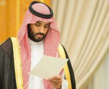 Saudi Arabia's Deputy Crown Prince Mohammed bin Salman looks at a document as Saudi Arabia's cabinet agrees to implement a broad reform plan known as Vision 2030 in Riyadh, April 25, 2016. PHOTO BY REUTERS/Saudi Press Agency