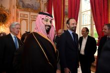 French Prime Minister Edouard Philippe (R) escorts Saudi Arabia's Crown Prince Mohammed bin Salman upon his arrival at the Hotel de Matignon in Paris, France, April 9, 2018. PHOTO BY REUTERS/Eric Feferberg