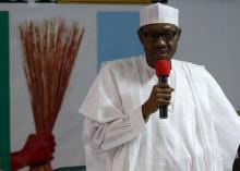 President Muhammadu Buhari addresses members of the National Working Committee during the meeting of the All Progressives Congress (APC) party at the headquarters of the party in Abuja, Nigeria, July 3, 2015. PHOTO BY REUTERS/Afolabi Sotunde