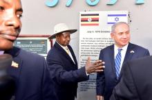 Uganda's President Yoweri Museveni (L) speaks to Israeli Prime Minister Benjamin Netanyahu (R) during a memorial service to commemorate the 40th anniversary of Operation Entebbe at the Entebbe airport in Uganda, July 4, 2016. PHOTO BY REUTERS/Presidential Press Unit