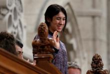 Nadia Murad Basee Taha, United Nations Goodwill Ambassador for the Dignity of Survivors of Human Trafficking, waves while being recognized by the Speaker in the House of Commons on Parliament Hill in Ottawa, Canada, October 25, 2016. PHOTO BY REUTERS/Chris Wattie