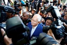 Malaysia's former prime minister Najib Razak arrives to give a statement to the Malaysian Anti-Corruption Commission (MACC) in Putrajaya, Malaysia, May 22, 2018. PHOTO BY REUTERS/Lai Seng Sin