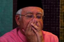 Malaysia’s former Prime Minister Najib Razak prays before he attends the United Malays National Organisation (UMNO) 72th anniversary celebrations in Kuala Lumpur, Malaysia, May 11, 2018. PHOTO BY REUTERS/Athit Perawongmetha