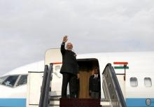 India's Prime Minister Narendra Modi waves as he boards a plane after his trip to Kabul, Afghanistan, December 25, 2015. PHOTO BY REUTERS/Mohammad Ismail