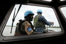 A Bangladeshi Navy (R) and an Indian army peacekeepers with UNMISS (UN Mission in South Sudan) take part in a patrol on the white Nile near the town of Malakal, in the Upper Nile state of South Sudan, September 8, 2018. PHOTO BY REUTERS/Baz Ratner
