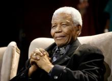 Former South African President Nelson Mandela attends the Sixth Annual Nelson Mandela lecture in Kliptown, near Johannesburg, South Africa, July 12, 2008. PHOTO BY REUTERS/Mike Hutchings