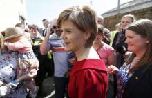 Scottish National Party (SNP) leader Nicola Sturgeon greets supporters during a campaign visit to in Ayr, Scotland, in this April 21, 2015 file photo. PHOTO BY REUTERS/Russell Cheyne