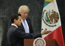 U.S. Republican presidential nominee Donald Trump and Mexico's President Enrique Pena Nieto arrive for a press conference at the Los Pinos residence in Mexico City, Mexico, August 31, 2016. PHOTO BY REUTERS/Henry Romero